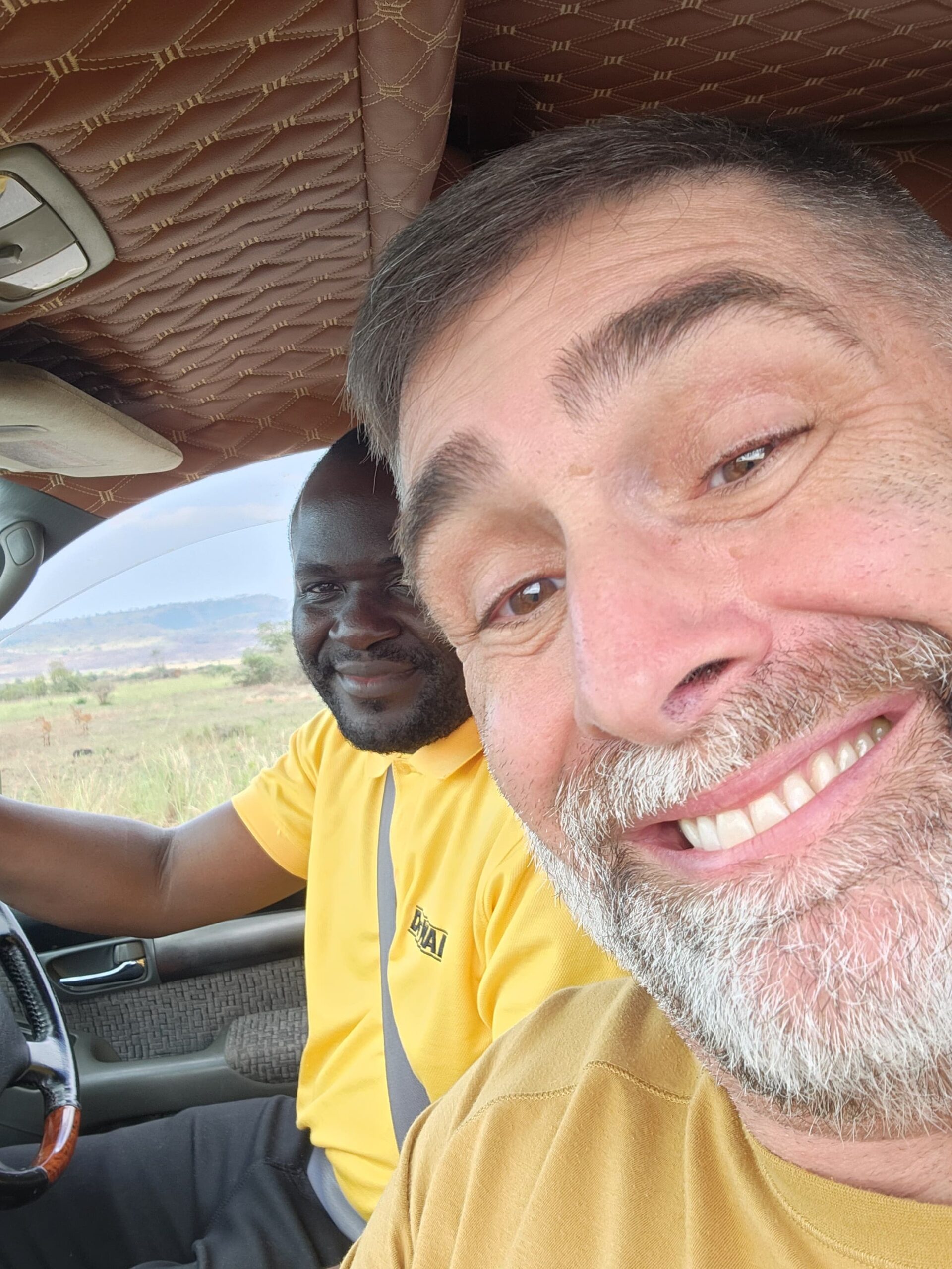 Uganda Driver guide with elderly travelers