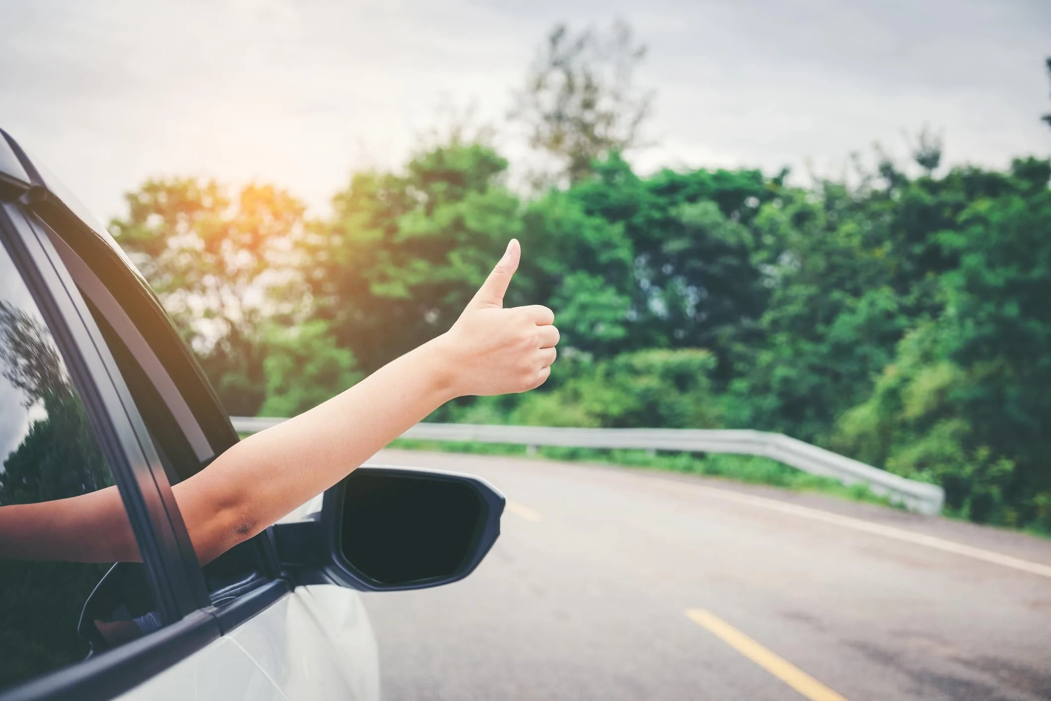 waving-when-driving-car-uganda - Rent A Driver Uganda Silent road language